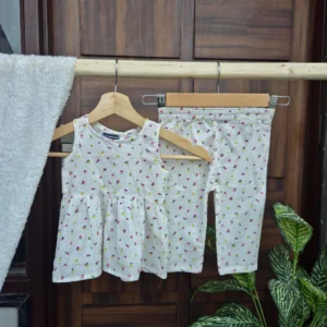 printed sleeveless frill top with trousers